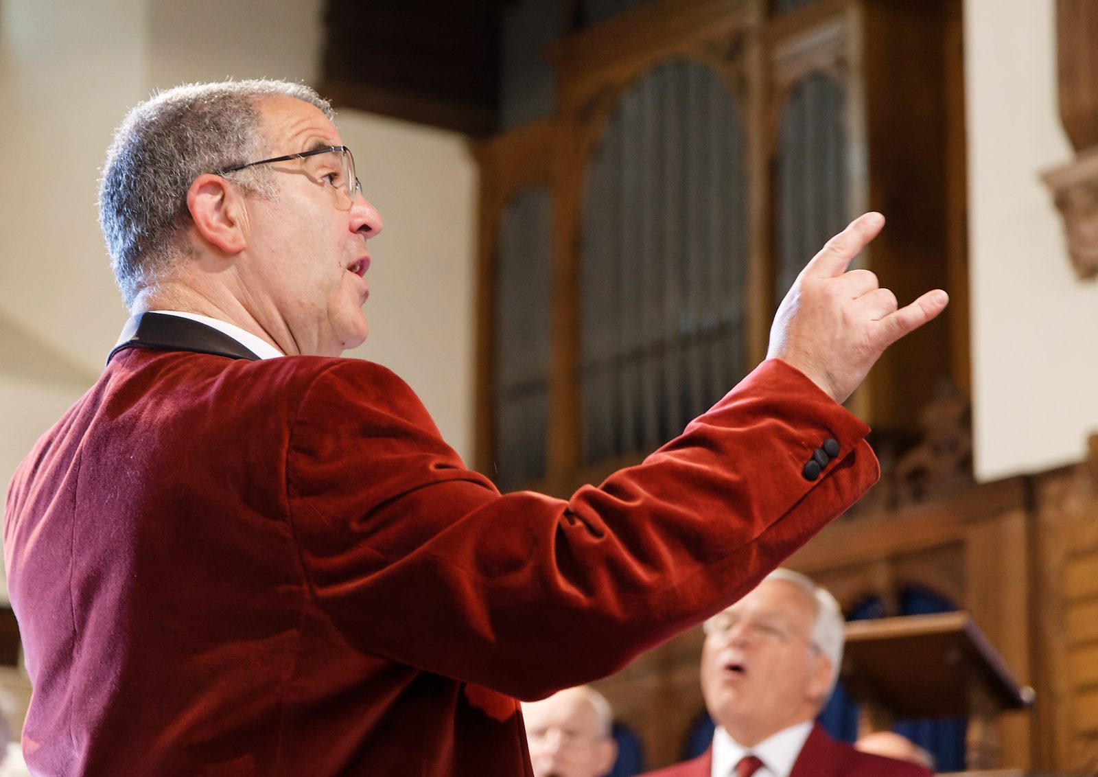 Michael Deakin conducting the choir
